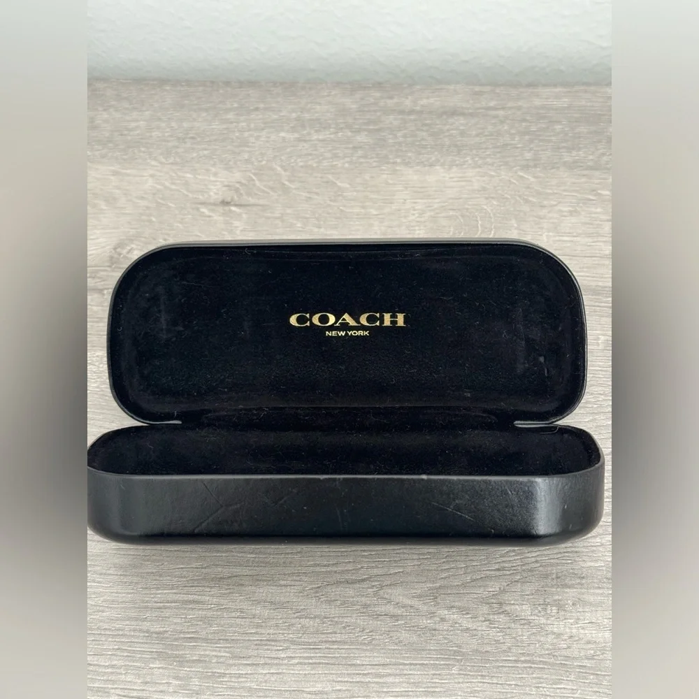 COACH New York Glasses case Black. Used. Has some small dents. See photo.